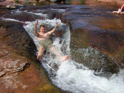 Liam sliding at Slide Rock, 9th September 2004.