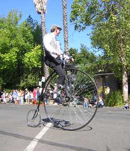 Man on a Penny Farthing bike