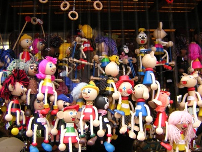 Puppets hanging on a market stall, Prague 16th August 2005