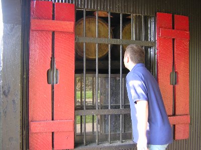 Liam sniffs the whisky at Maker's Mark distillery, Kentucky, September 1st 2004.