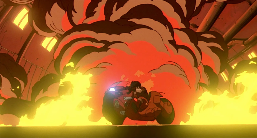 Kaneda riding his red motorbike through an explosion in Akira (1988)